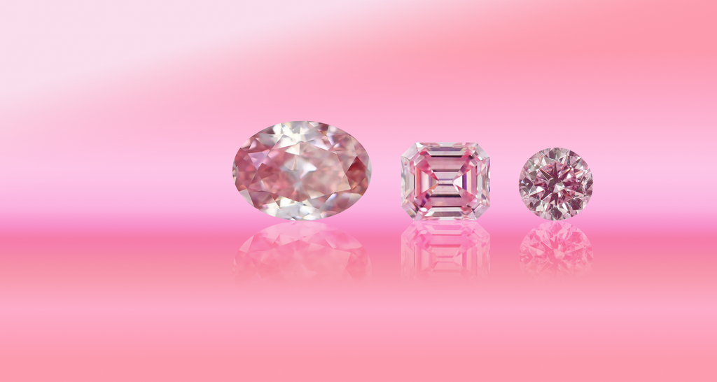 Three Argyle diamonds on a pink background with earthy and pinkish tones, collection image of Argyle Pink Diamonds of Noemi Diamonds