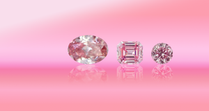 Three Argyle diamonds on a pink background with earthy and pinkish tones, collection image of Argyle Pink Diamonds of Noemi Diamonds