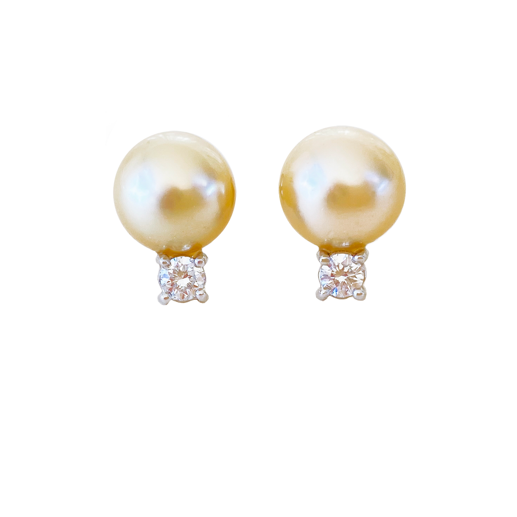 A pair of perfect Champagne Akoya pearl studs with diamonds