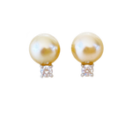 A pair of perfect Champagne Akoya pearl studs with diamonds