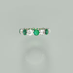 Eternity diamond and emerald ring
