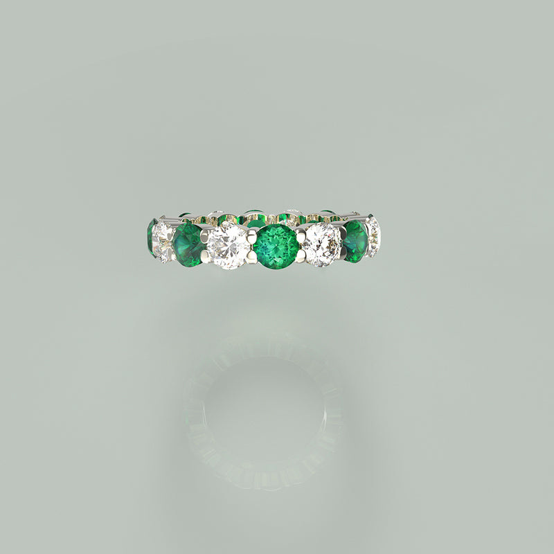 Eternity diamond and emerald ring